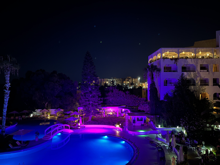 Photo of the hotel swimming pool at night